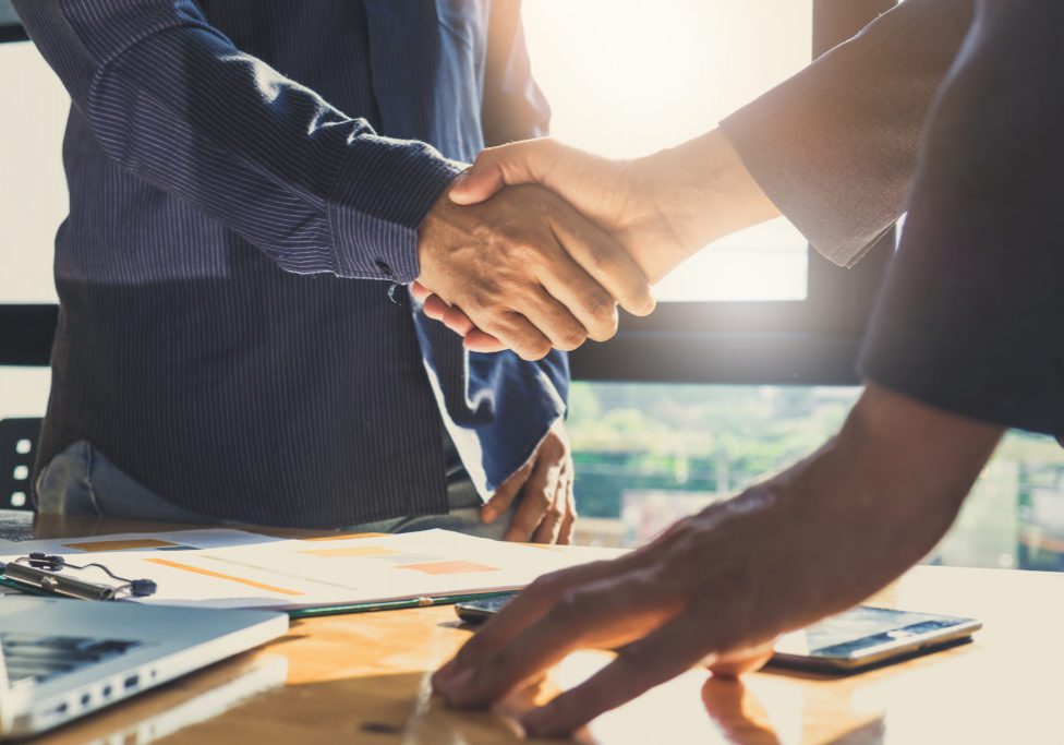 Business partnership meeting concept. Image businessmans handshake. Successful businessmen handshaking after good deal. Group support concept. Business partnership meeting concept. Image businessmans handshake. Successful businessmen handshaking after good deal. Group support concept.